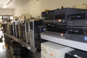 Room contained with old computer CPU system on shelves